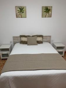 Postel nebo postele na pokoji v ubytování Apartamentos custodio