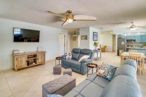 A seating area at Waterfront Merritt Island Vacation Rental with Pool!