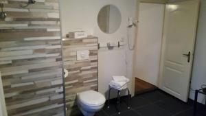 
Een badkamer bij Gasterij de Poort
