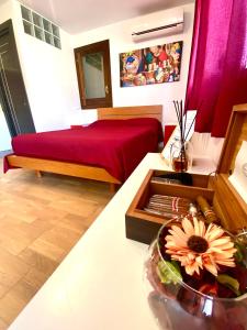 En eller flere senge i et værelse på Casa Sole