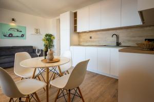 A cozinha ou cozinha compacta de Lea Apartments
