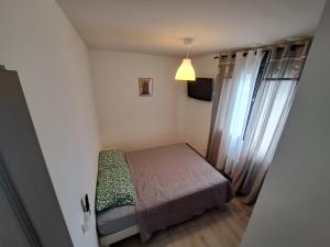 Postel nebo postele na pokoji v ubytování Charmante Maison avec Piscine