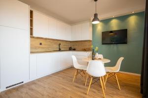 A cozinha ou cozinha compacta de Lea Apartments