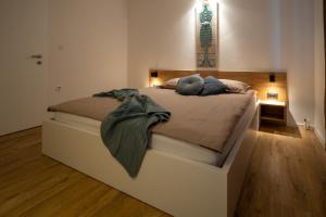 Cama ou camas em um quarto em Lea Apartments