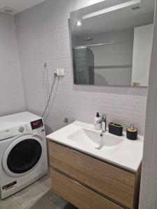 Kylpyhuone majoituspaikassa Magnifique Duplex vue mer
