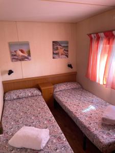 Posteľ alebo postele v izbe v ubytovaní Chalet-home familiar "CAL DENVER" "Pet friendly" + 15 fotografií