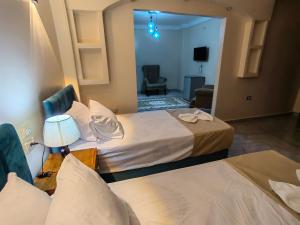Katil atau katil-katil dalam bilik di Gem Overlooking inn