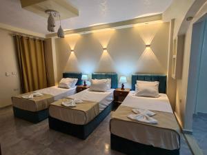 Katil atau katil-katil dalam bilik di Gem Overlooking inn