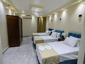 Katil atau katil-katil dalam bilik di Gem Overlooking inn