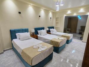 Katil atau katil-katil dalam bilik di Gem Overlooking inn