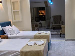 Katil atau katil-katil dalam bilik di Gem Overlooking inn
