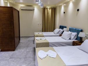 Katil atau katil-katil dalam bilik di Gem Overlooking inn