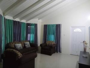 Area soggiorno di Ocean View Get Away
