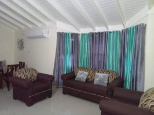 Area soggiorno di Ocean View Get Away