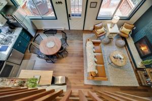 an aerial view of a living room with a table and chairs at Camp Cedar:7 miles to Camelback, 5 to Kalahari! in Long Pond