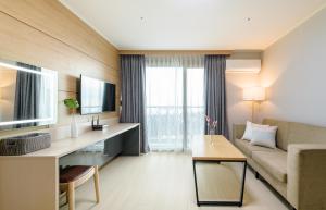 TV a/nebo společenská místnost v ubytování Seogwipo Worldcup Resort