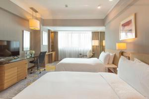 Letto o letti in una camera di Four Points by Sheraton Shanghai, Pudong