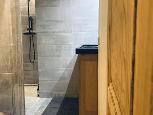 a bathroom with a shower and a sink at Chalet Crest-Voland, 6 pièces, 10 personnes - FR-1-733-70 in Crest-Voland