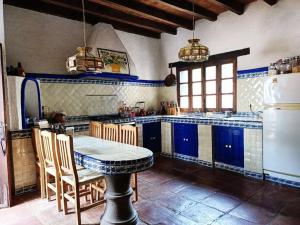 Virtuvė arba virtuvėlė apgyvendinimo įstaigoje Casa Inés