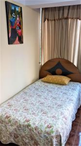 Carlos Guest House 2 Cusco客房内的一张或多张床位