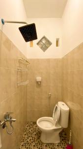 Koupelna v ubytování Nitha Homestay