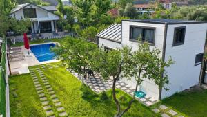 an aerial view of a house with a swimming pool at Sea Life Homes in Kemer