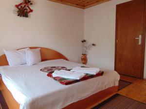 Postel nebo postele na pokoji v ubytování Sarafova Guest House + 12 fotografií