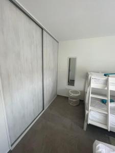 a small room with a bunk bed and a toilet at Apartman Mara Vodice in Vodice +17 photos