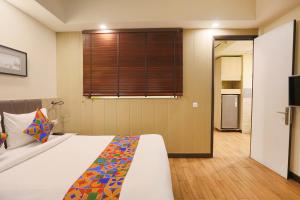 Krevet ili kreveti u jedinici u okviru objekta FabHotel Sapphire 83
