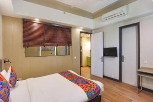 TV i/ili multimedijalni sistem u objektu FabHotel Sapphire 83