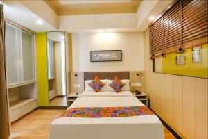 Krevet ili kreveti u jedinici u okviru objekta FabHotel Sapphire 83