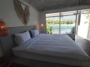 Hub Tata Guesthouse客房内的一张或多张床位