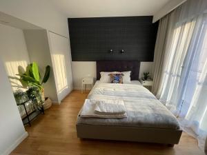 Posteľ alebo postele v izbe v ubytovaní Komfort w najlepszej lokalizacji