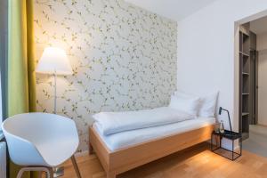Linde Heiden Swiss Quality Hotel客房内的一张或多张床位