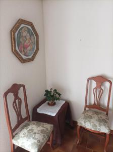 Coin salon dans l'établissement Casa de Familia Estela Baño Compartido