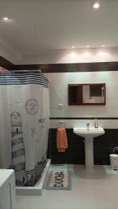 Ванная комната в Casa de Familia Estela Baño Compartido