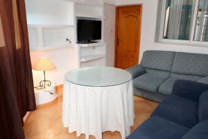 Televízia a/alebo spoločenská miestnosť v ubytovaní Chalet Completo Luna de Carboneras