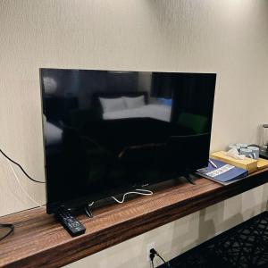TV a/nebo společenská místnost v ubytování AYA Hotel