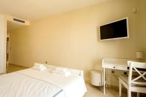 Łóżko lub łóżka w pokoju w obiekcie Luxury apartment Sotogrande