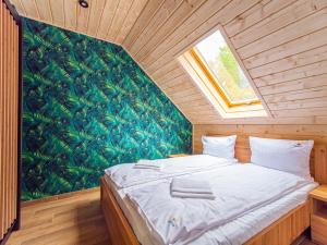 Postel nebo postele na pokoji v ubytování Apartamenty Sailor