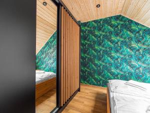 Postel nebo postele na pokoji v ubytování Apartamenty Sailor