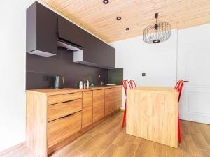 Kuchyň nebo kuchyňský kout v ubytování Apartamenty Sailor