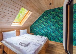 Postel nebo postele na pokoji v ubytování Apartamenty Sailor