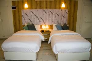 Tempat tidur dalam kamar di Desert Season Camp
