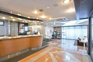a lobby of a hospital with a waiting room at Wakayama Daini Fuji Hotel in Wakayama