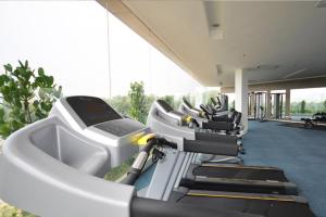 a row of exercise bikes in a gym at Play at HELLO KITTY Kawaii Fun House in Kuala Lumpur