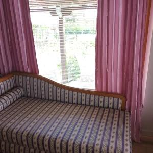 Postel nebo postele na pokoji v ubytování Apartmani sa pogledom na Dunav - Akademik