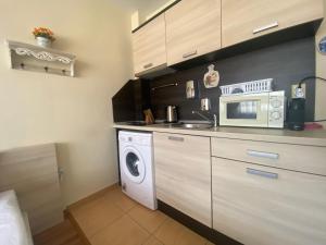 A kitchen or kitchenette at SUMMER BREEZE 406 Studio Sunny Beach