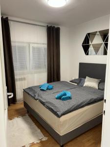 Ένα ή περισσότερα κρεβάτια σε δωμάτιο στο Apartman Lara +33 φωτογραφίες