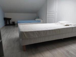 Posteľ alebo postele v izbe v ubytovaní Maison des Pins + 5 fotografií
